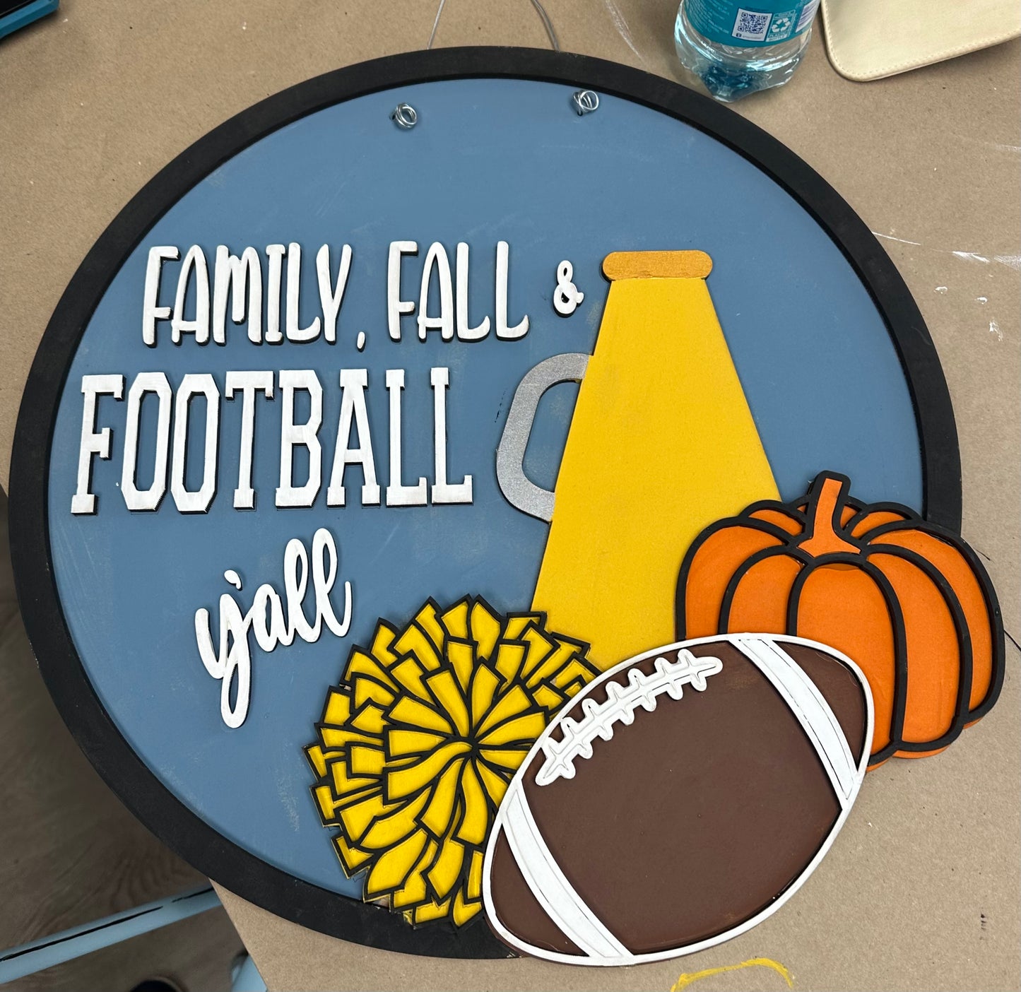 Family, Fall, and Football Round sign